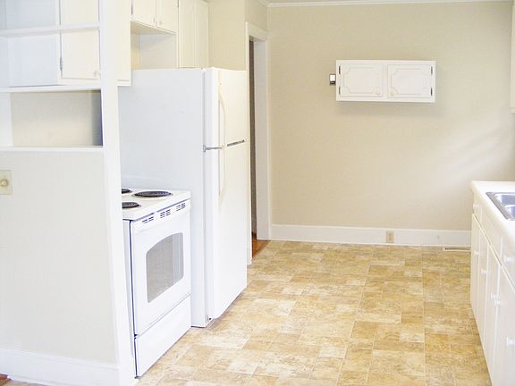 Large kitchen with appliances