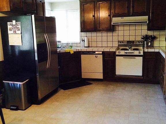 Kitchen- fridge belongs to tenant.