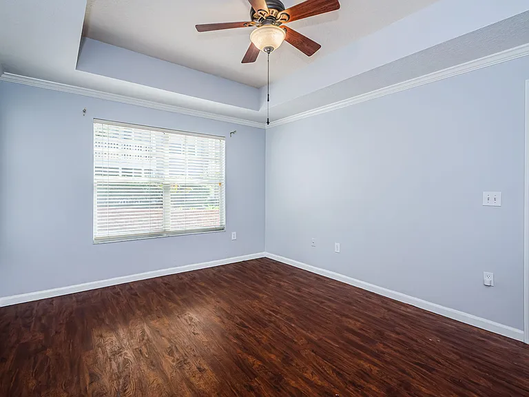 primary bedroom with private bath and walk in closet