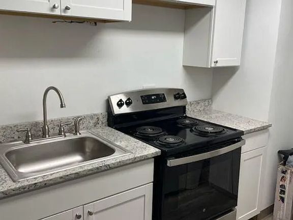 new kitchen, granite, frig, oven