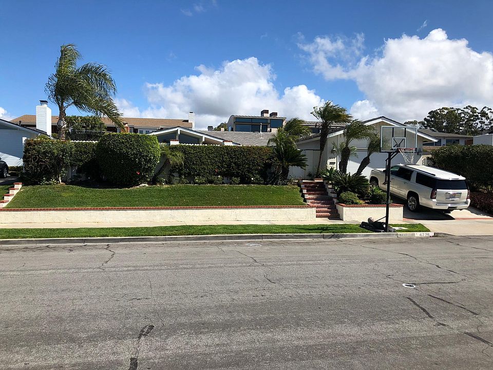 Street view of house; private on one of the best streets in Cameo Highlands