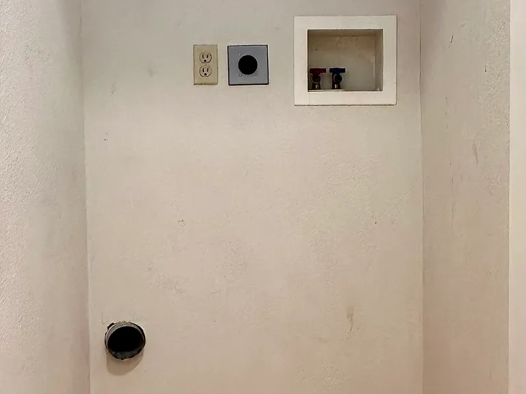 Hookup for stackable washer and dryer.