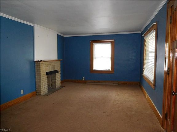 Living room is 27x12.   Gas fireplace and carpeted.