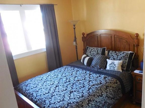 Bedroom with walk in closet