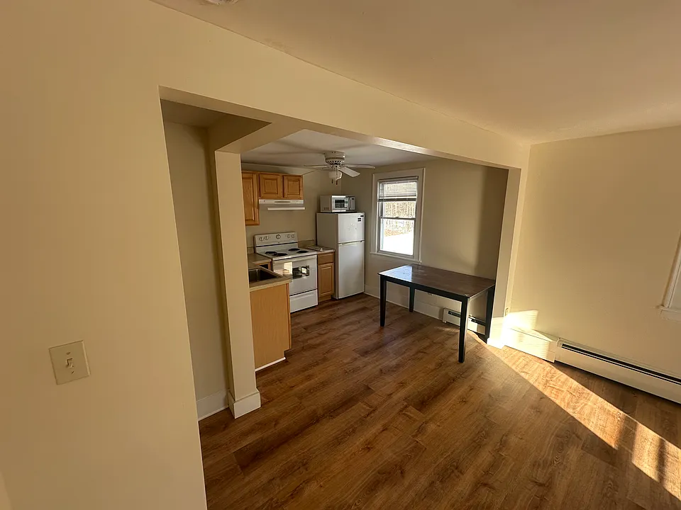 Kitchen and living space flow together. Dimensions for kitchen and living space are 20' x 12'.
