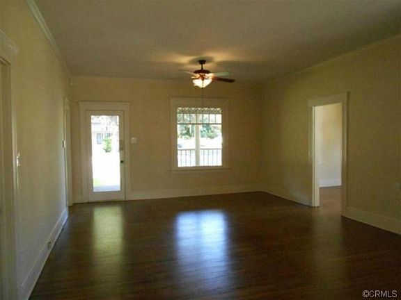 Living room (walls are being repainted white).