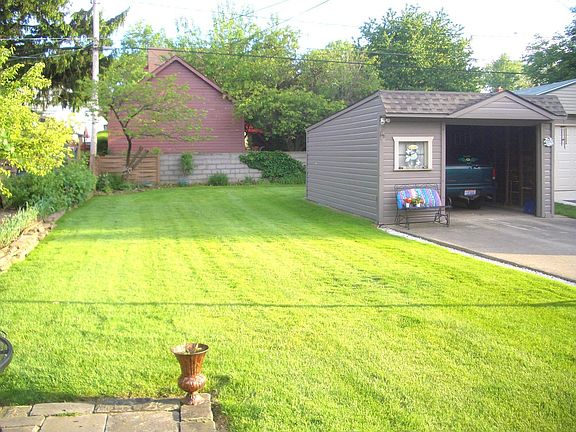 Rear Yard & View of Garage