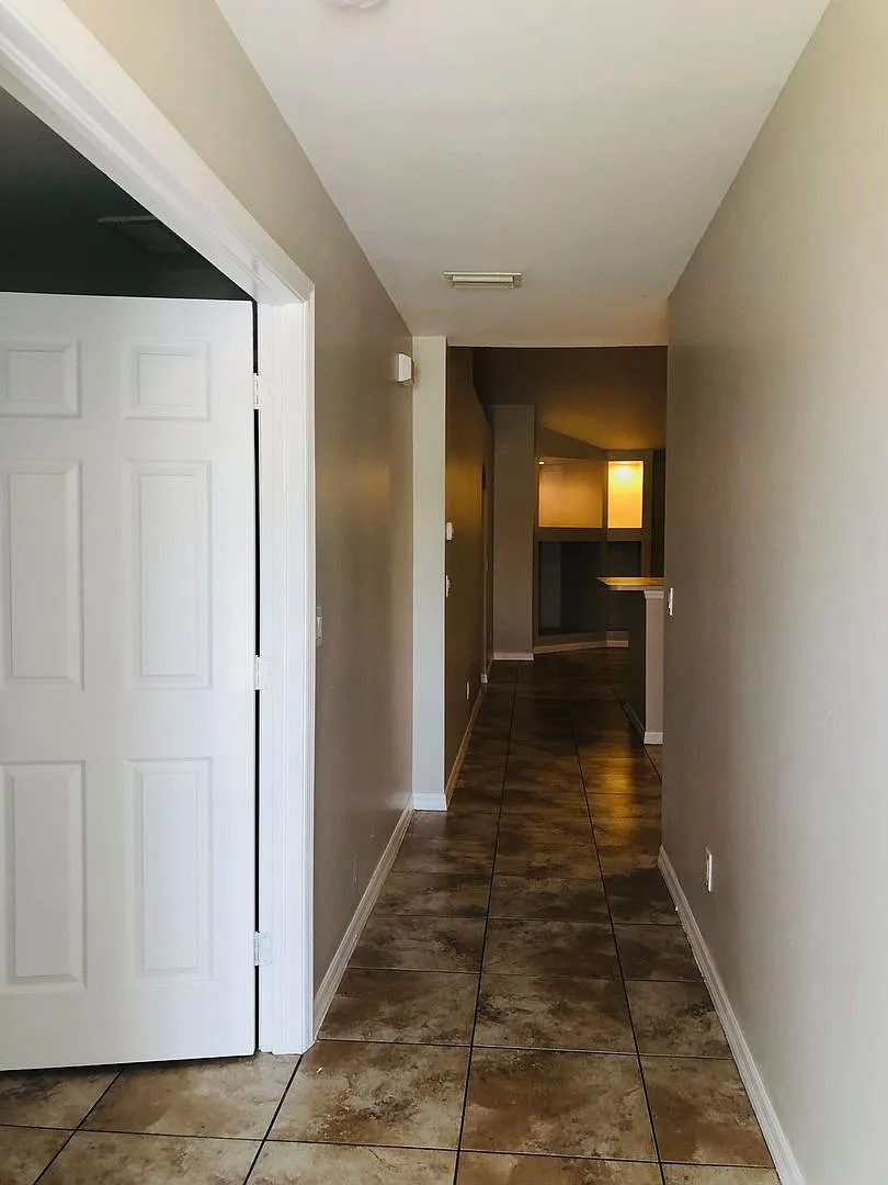 Experience this Cape Coral 3 bedroom 2 bath duplex with 1 car garage and screened in lanai. — Photo 3