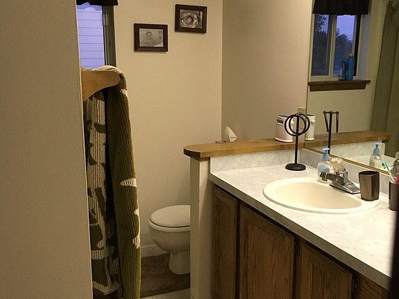 Full bath with lots of counter space. Linen closet in the b