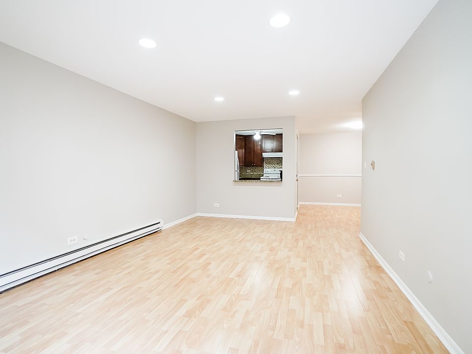 View of living room from balcony door. Living room is 16.6' X 11.75'.