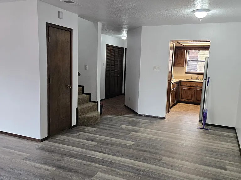 Large great room, kitchen, 1/2 bath and laundry downstairs