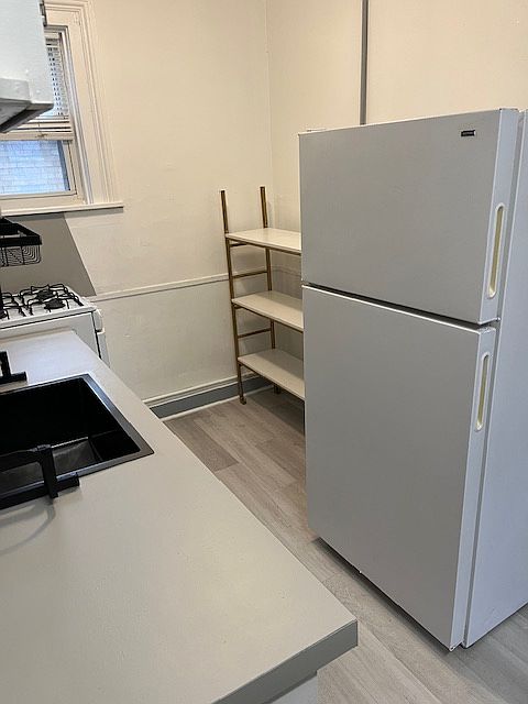 Kitchen refrigerator and storage area