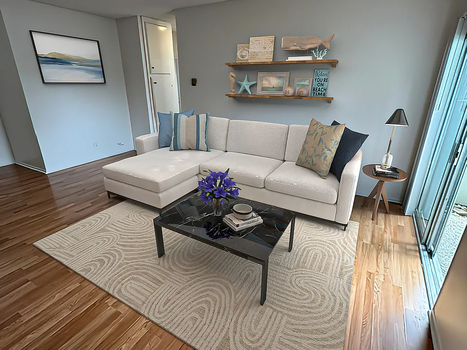 Very large and open living room with sliding glass door access to the private patio