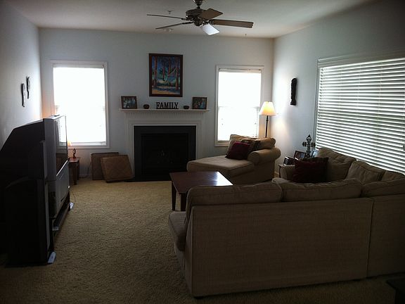 family room with gas fire pl