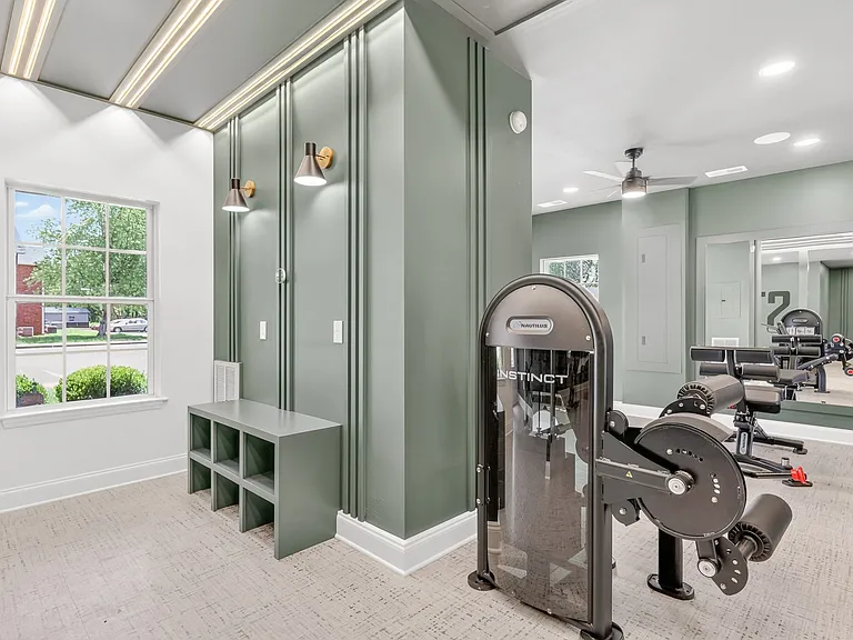 24-hour health and wellness center at Saddlebrook Apartments featuring top-of-the-line cardio equipment, strength training stations, and premium fitness amenities.