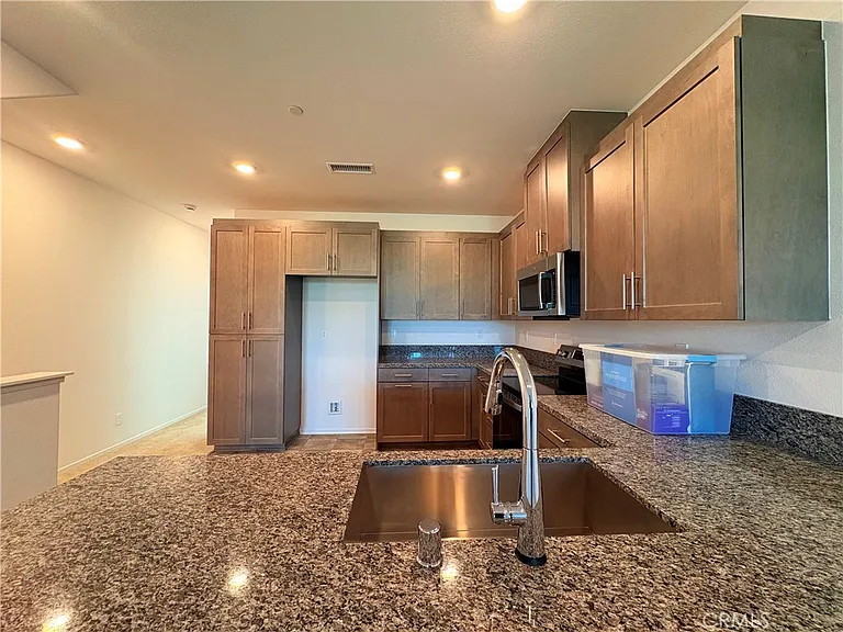 8439 Bickmore Ave #8439 — Photo 16