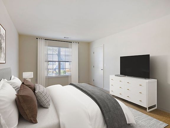 Bedroom with carpet