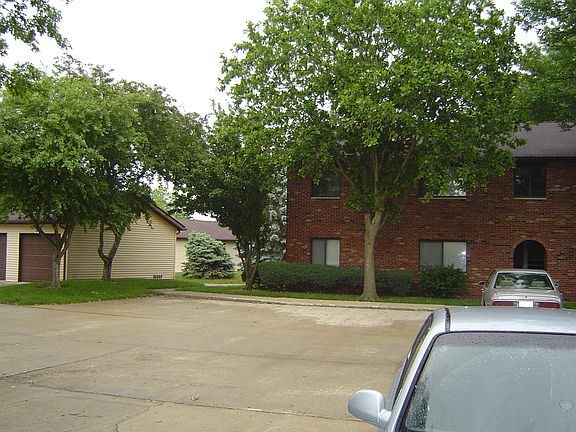 1-car garage and extra parking spaces in front of condo. 