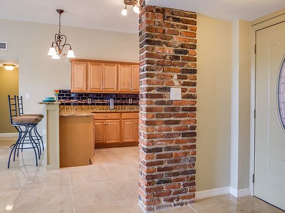 Exposed brick/breakfast bar