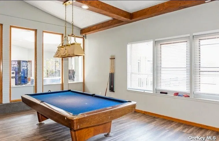 Pool table, corn hole, in clubhouse
