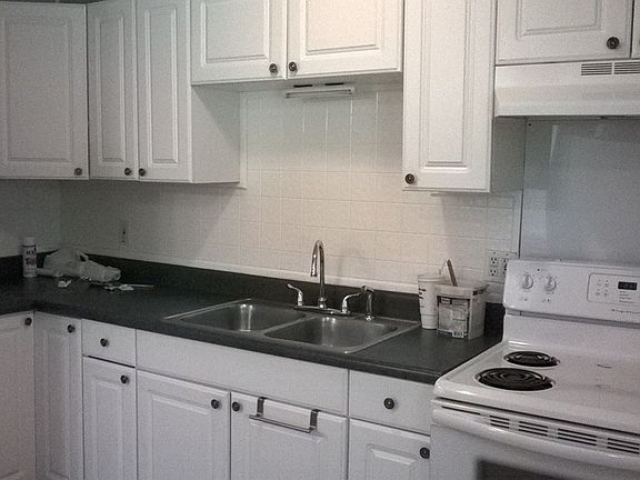 kitchen sink, electric range, new refrigerator