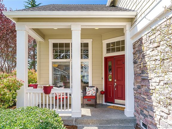 Welcoming covered front porch to greet your guests.