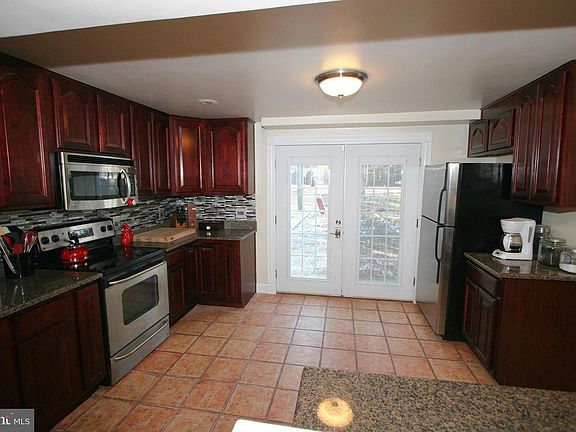 kitchen - french door to brick patio backyard
