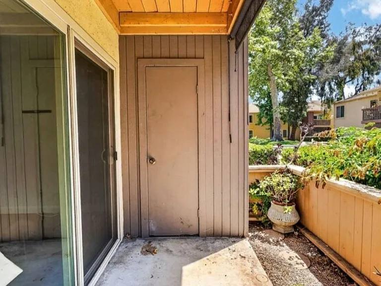Private back patio with locked storage area