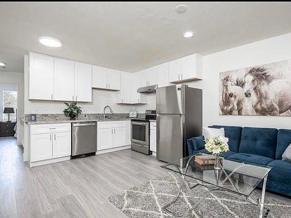 Recently remodeled. Furniture Not included. New laminate floors, lighting, blinds, cabinets, stainless steel appliances (stove, fridge, dishwasher)