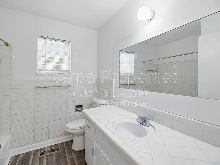 313 E Woodrow Pl — Photo 23
