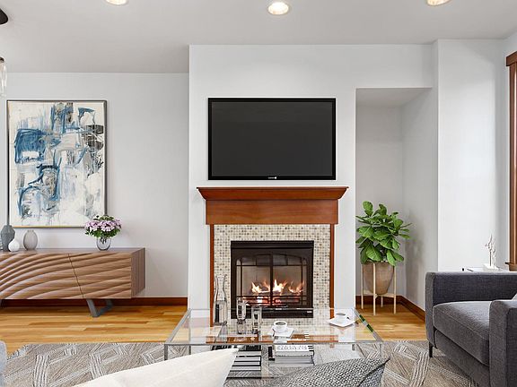 Living room with gas fireplace and media nook. (second floor)