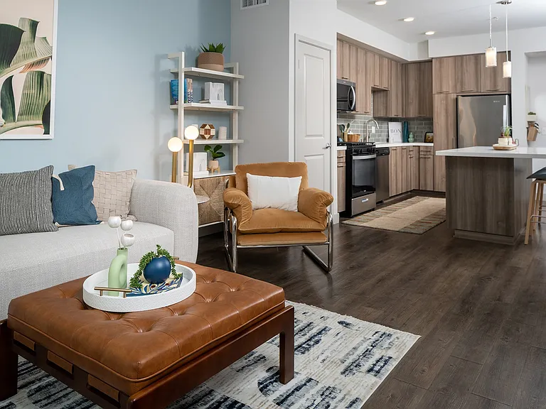 Luxury vinyl plank flooring is available in entry, kitchens, and select living and dining spaces