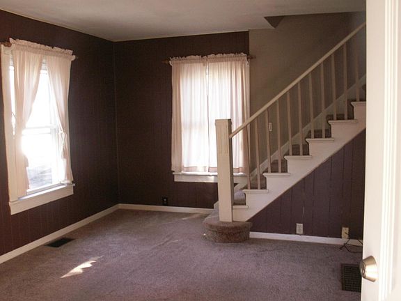 Living Room with Open Stair Case