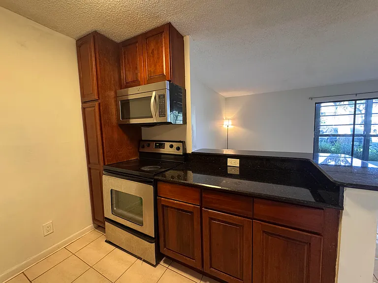 809 NE 199th St #105-7 — Photo 31