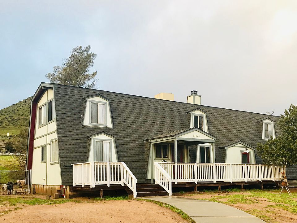 A gambrel A-Frame style home.