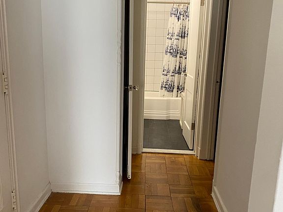 Unit hallway with linen closet