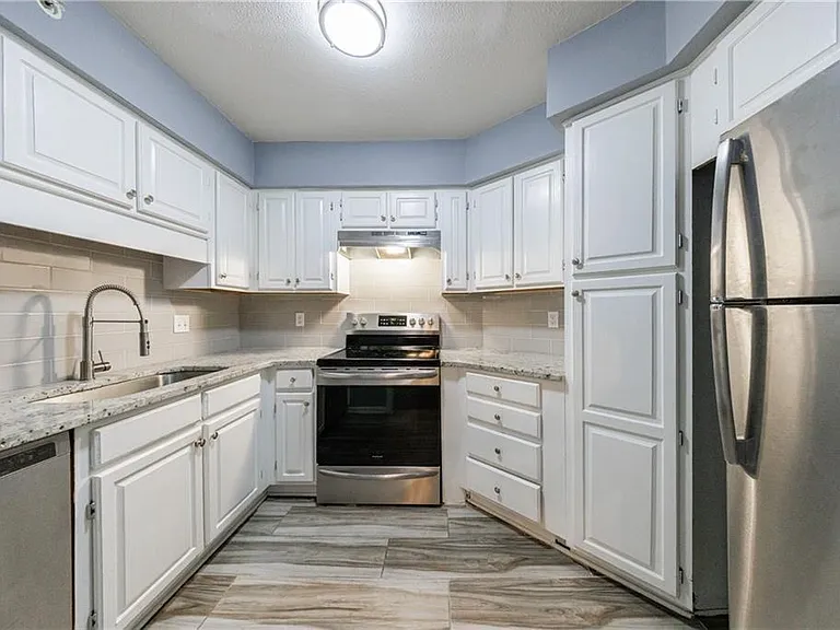 27306 Plantation Dr NE #306 — Photo 41