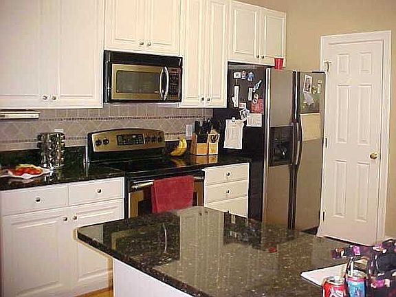 Kitchen with granite countertops