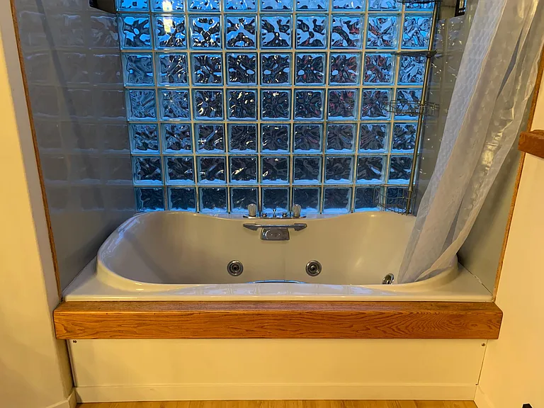 Jet hot tub jacuzzi in the master bathroom.