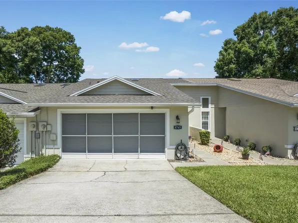 8745 VILLAGE GREEN BLVD, CLERMONT, FL 34711