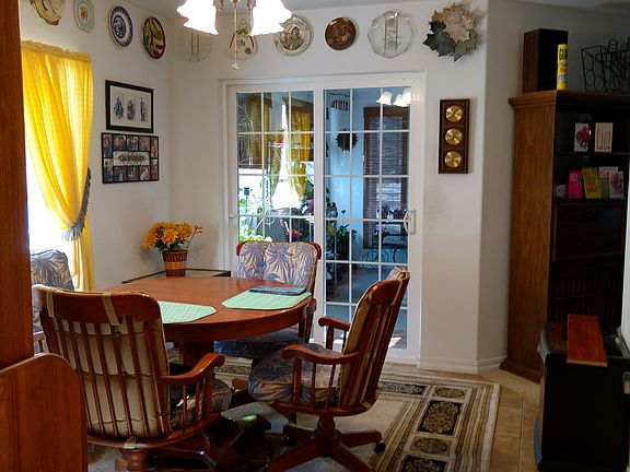 Dining looking into Sunroom.