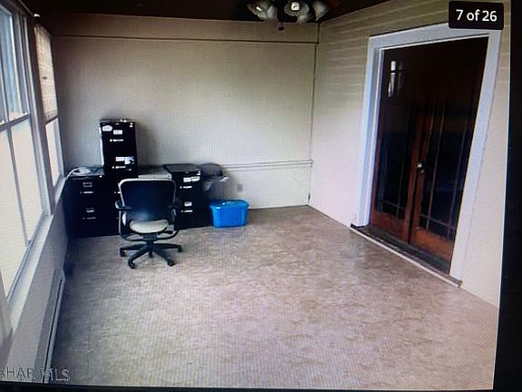 Small mudroom off living room
