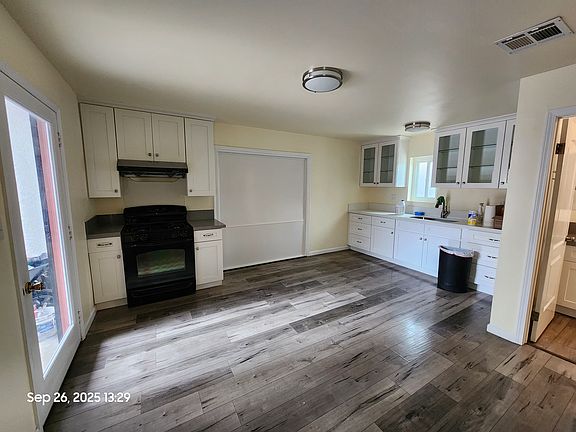 Stove and range included.