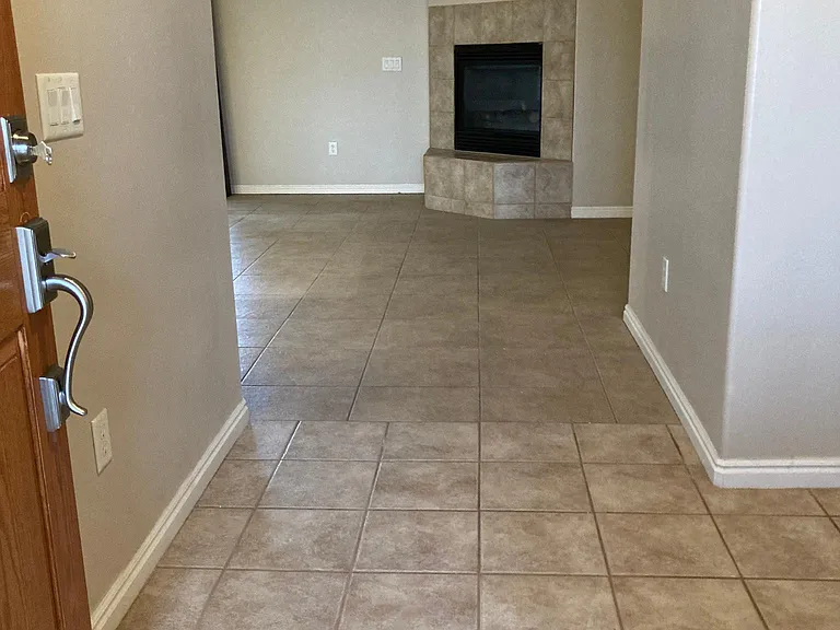 Tile floors in entry way, living room and kitchen