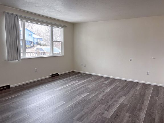 Great natural light in the front living room. front deck.