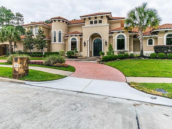 This gorgeous custom home boast a circular driveway on nearly a 1/2 acre golf course lot.