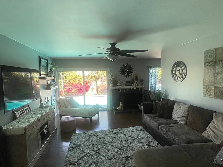 Living room -slider to back yard. 
Galley kitchen behind living room wall with entrances at both ends.