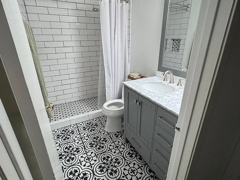 Bathroom across bedroom