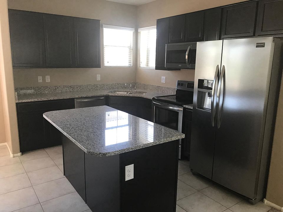 Premium kitchen featuring granite and stainless
