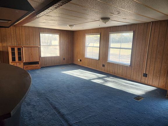 Living room with plenty of natural light.